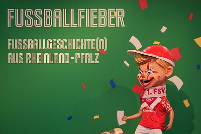 zur Ausstellung FUSSBALLFIEBER